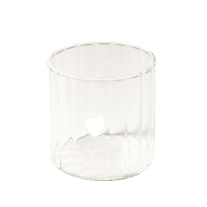 Clear glass tumbler with a white love heart on a white background. Part of the Robert Gordon Collection stocked at LOVINLIFE Co Byron Bay for all your gifts, candles, homewares and interior decorating needs