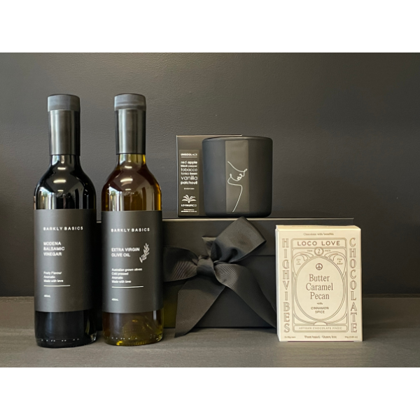 Gourmet Pantry Gift Box containing Extra Virgin Olive Oil, Balsamic Vinegar,  Hand Poured Black Wax UNISEX Candle and a twin box of Loco Love Chocolates. Available at LOVINLIFE Co Byron Bay