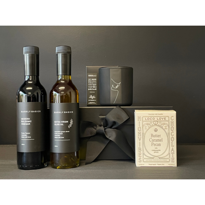 Gourmet Pantry Gift Box containing Extra Virgin Olive Oil, Balsamic Vinegar,  Hand Poured Black Wax UNISEX Candle and a twin box of Loco Love Chocolates. Available at LOVINLIFE Co Byron Bay