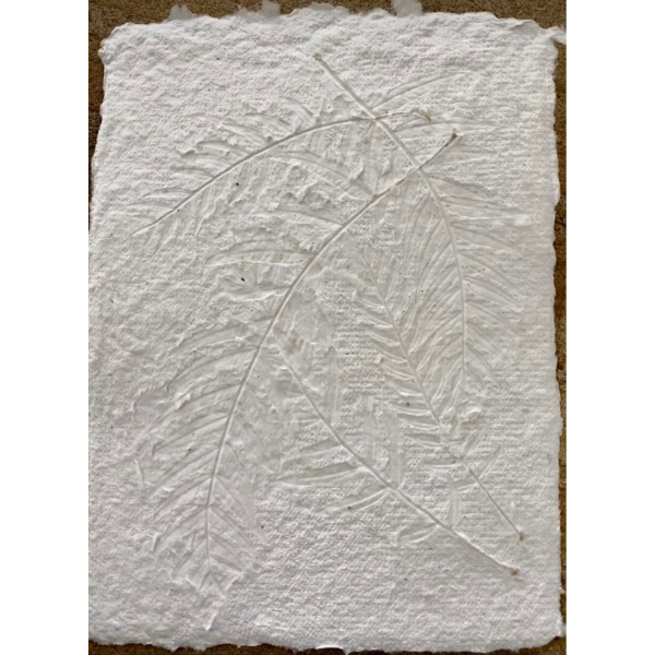 Flat lay close up of the texture of a Hand Pressed Paper A5 page in white, embossed with natural leaves. Stocked at LOVINLIFE Co Byron Bay for all your gifts, candles and interior decorating needs 