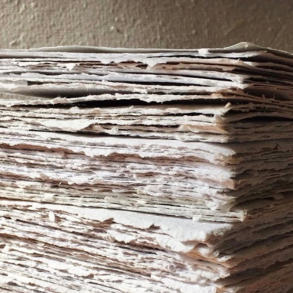 Stack of hand pressed paper on a neutral background. Stocked at LOVINLIFE Co Byron Bay for all your gifts, candles and interior decorating needs