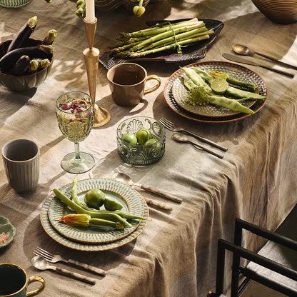 Iris Brass Candle Stand on a dressed table with a green theme - available at LOVINLIFE Co Byron Bay for all your gifts, candles and interior decorating needs