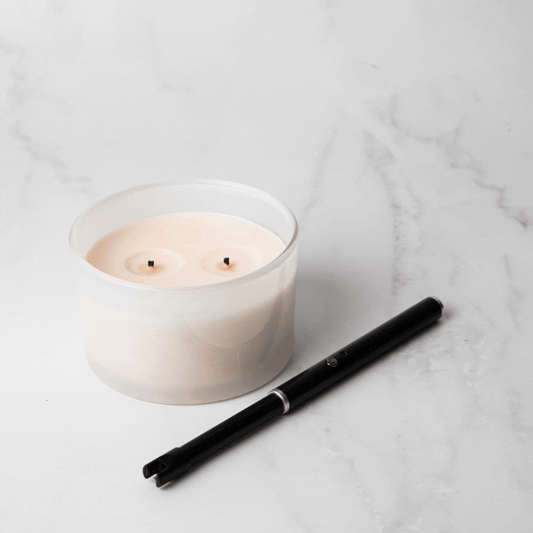 USB Rechargeable Candle and Incense Lighter - Black Lighter pictured lighting twin wick candle - Stocked at LOVINLIFE Co Byron Bay for all your gifts, candles and interior decorating needs