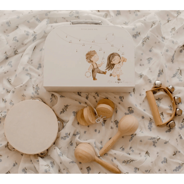 Little Love Music Set for children. Set includes: Maracas (x2) Castanets (x2) Tambourine Drum (x1) Hand bells (x1)  Suitcase (x1). Comes with a beautiful in house designed suitcase to pack up and store the instruments in. Made with Wood, iron and leather. All  instruments by Love Note Co are handmade items, non-toxic, eco-friendly and sustainably sourced. Stocked at LOVINLIFE Co Byron Bay for all your gifts, candles and interior decorating needs