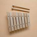 Little Noted Xylophone made with FSC certified Birch & Beechwood, and Metal. One of a kind hand-crafted and exclusively in house designed 8 key xylophone (x2 mallets & cotton canvas bag included). Made with Wood, iron and leather. All  instruments by Love Note Co are handmade items, non-toxic, eco-friendly and sustainably sourced. Stocked at LOVINLIFE Co Byron Bay for all your gifts, candles and interior decorating needs