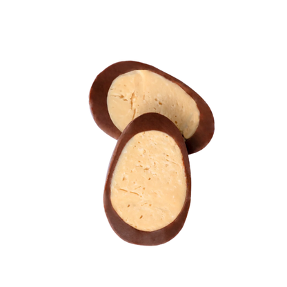 A Loco Love Cosmic Egg - Coconut Dream cut in half to show the filling. Available at LOVINLIFE Co Byron bay