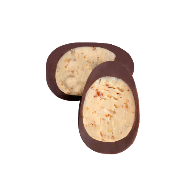 A Loco Love Cosmic Egg - Salted Caramel cut in half to show the filling. Available at LOVINLIFE Co Byron bay