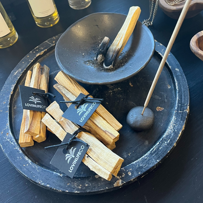 Lovinlife Co ByronBay - Palo Santo Stick Bundle - Burning Ritual Stick - 3 stacks next to black clay smudging bowl - available at LOVINLIFE Co Byron Bay for all your gifts, candles and interior decorating needs