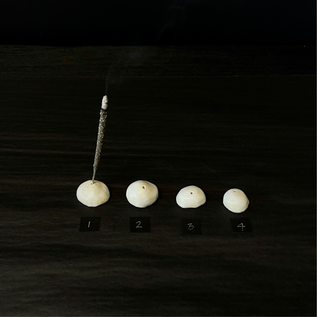 Lovinlife Co ByronBay – handmade Ceramic Pebble Incense Holder to hold your favourite incense – all sizes pictured, one holding smoking incense stick - available at LOVINLIFE Co Byron Bay for all your gifts, candles and interior decorating needs