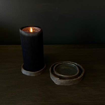 Lovinlife Co ByronBay - Handmade Signature Ceramics Range - Dark Matter Slab Series, matt black stone finish clay pieces - Slab Fold Smudging bowl / dishes x 3, pictured with one holding buring ribbed black pillar candle and the other two stacked - available at LOVINLIFE Co Byron Bay for all your gifts, candles and interior decorating needs