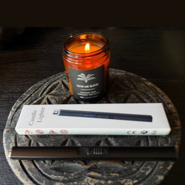 Natural soy Candle in a glass jar labelled 'Love Me Blend' on Vintage Indian Wood Chapati Plate with a USB Rechargeable Candle and Incense Lighter - Black Lighter pictured next to it's box. Stocked at LOVINLIFE Co Byron Bay for all your gifts, candles and interior decorating needs