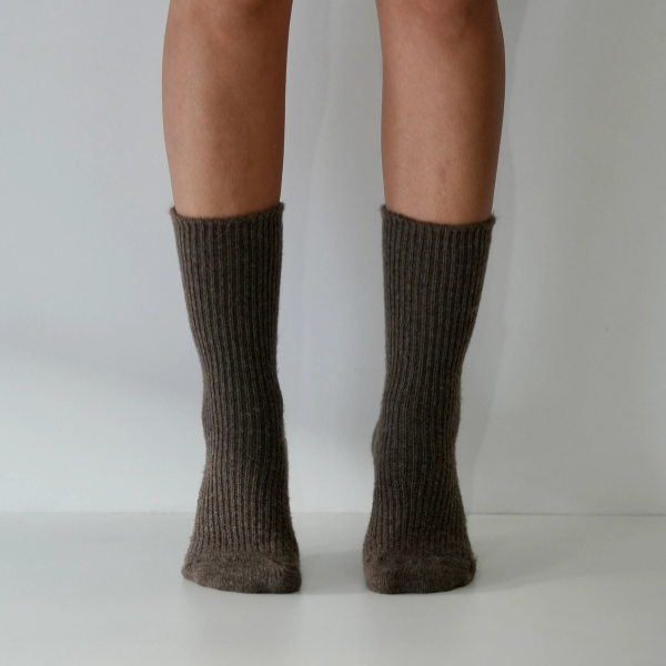 Chocolate coloured socks on a person’s feet, front view, on a plain background. Luxe Cashmere Blend Socks by Number Thirty One made with a premium blend of cashmere and wool. Unisex & One size. Stocked at LOVINLIFE Co Byron Bay for all your gifts, candles and interior decorating needs