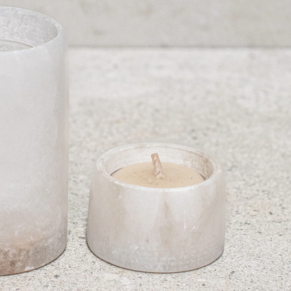 Alabaster Votive Candles by Natures Atelier - small size pictured on a natural coloured bench - Stocked at LOVINLIFE Co Byron Bay for all your gifts, candles and interior decorating needs