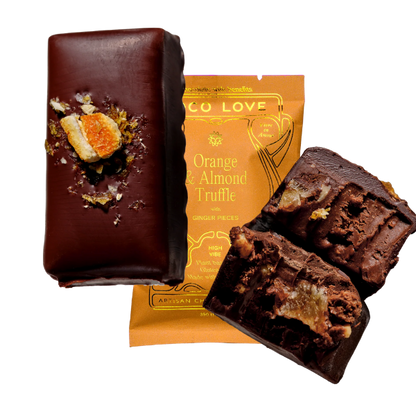 Images shows unwrapped and wrapped (orange) Loco Love Orange & Almond Truffle Chocolates. Vegan, gluten-free, sustainably sourced and no refined sugars. 
Available LOVINLIFE Co Byron Bay.