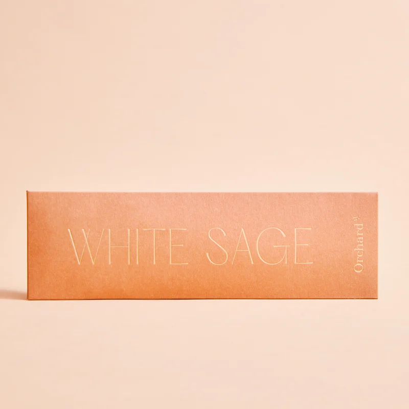 Orchard – Incense Natural White Sage. A pack of twelve sacred incense sticks pictured with the words “White Sage” on the front. Each stick is made entirely by hand, purely from plants and completely free of synthetic oils and fragrances - Stocked at LOVINLIFE Co Byron Bay for all your gifts, candles, homewares and interior decorating needs