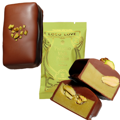 Unwrapped and wrapped (green) Loco Love Pistachio Mylk Praline Chocolates. Vegan, gluten-free, sustainably sourced and no refined sugars. Available LOVINLIFE Co Byron Bay.
