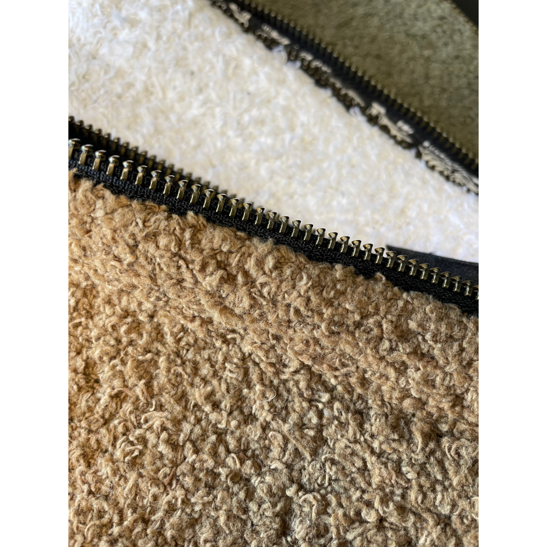 Travel Pouch - The Softee - made from cotton-boucle fabric, available in White, Tabac and Khaki/Olive – Pictured showing close up of fabric - Stocked at LOVINLIFE Co Byron Bay for all your gifts, candles, homewares and interior decorating needs