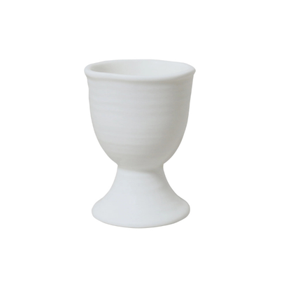 White ceramic egg cup on a white background. Part of the Robert Gordon Collection stocked at LOVINLIFE Co Byron Bay for all your gifts, candles, homewares and interior decorating needs