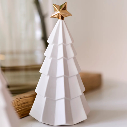 White ceramic Christmas tree with a gold star on a neutral background. Part of the Robert Gordon Collection stocked at LOVINLIFE Co Byron Bay for all your gifts, candles, homewares and interior decorating needs