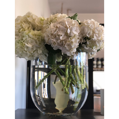 Round Base Candle Holder / Vase from Francalia in Clear, pictured holding a bunch of white hydrangeas - Stocked at LOVINLIFE Co Byron Bay for all your gifts, candles and interior decorating needs