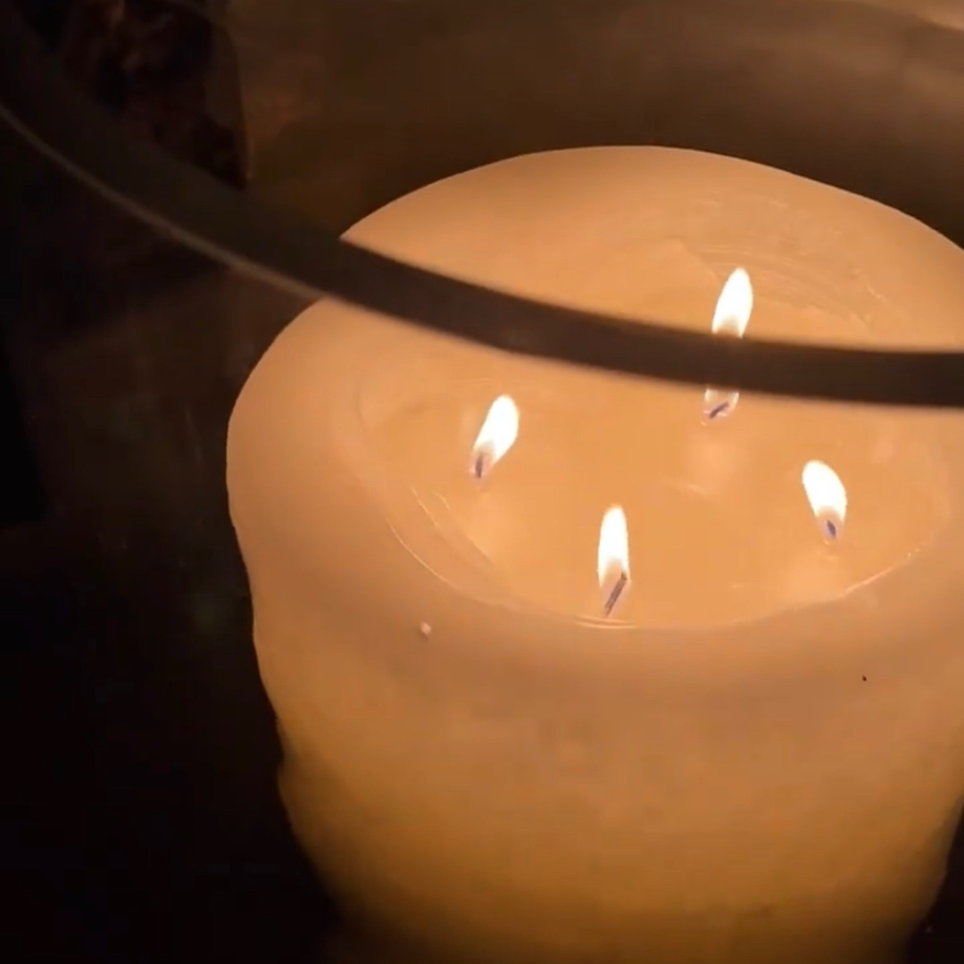 Round Base Candle Holder / Vase from Francalia in Clear, close up picture showing thickness of glass holding an alight multi wick candle - Stocked at LOVINLIFE Co Byron Bay for all your gifts, candles and interior decorating needs