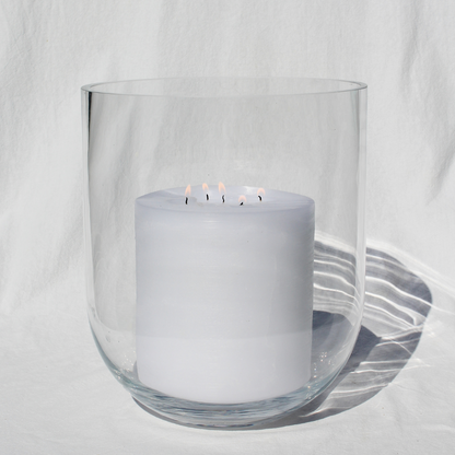 Round Base Candle Holder / Vase from Francalia in Clear, pictured holding a large multi wick white candle on a white background - Stocked at LOVINLIFE Co Byron Bay for all your gifts, candles and interior decorating needs