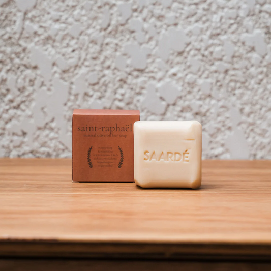 Lovinlife Co ByronBay – Saarde Saint-Raphaël Olive Oil Bar Soap - orange blossom, saffron, lemon and cinnamon scents – pictured on wooden bench with box - available at LOVINLIFE Co Byron Bay for all your gifts, candles and interior decorating needs