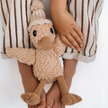 Child wearing striped pants holding a Soft Toy Duck made from our unique cotton plush fabric with caramel corduroy accents and Australian merino wool knitted beanie - Duck Edmond - Available at LOVINLIFE Co Byron Bay