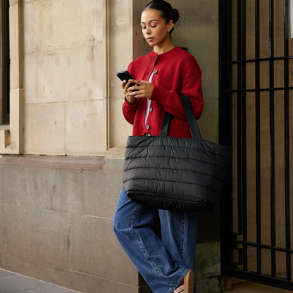 Take it Base Bag - A large soft-as-a-cloud shoulder bag for days on the go or weekends away - Black bag pictured being carried on forearm - Stocked at LOVINLIFE Co Byron Bay for all your gifts, candles and interior decorating needs