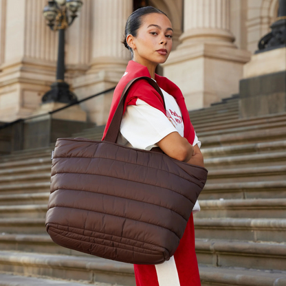 Take it Base Bag - A large soft-as-a-cloud shoulder bag for days on the go or weekends away - Chocolate bag pictured being worn on the shoulder - Stocked at LOVINLIFE Co Byron Bay for all your gifts, candles and interior decorating needs