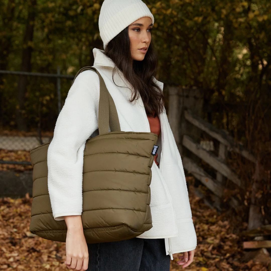 Take it Base Bag - A large soft-as-a-cloud shoulder bag for days on the go or weekends away - Khaki bag pictured  being worn on shoulder - Stocked at LOVINLIFE Co Byron Bay for all your gifts, candles and interior decorating needs