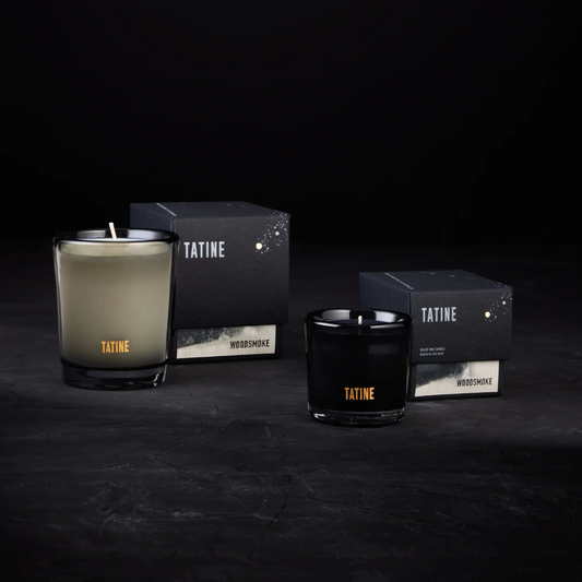 Tatine Woodsmoke Candle - A sweet, woody perfume of cedarwood, fir balsam, clove and fragrant forest resins - Natural Wax Candle in Smoke Grey Mouth Blown Glassware, pictured with box - Stocked at LOVINLIFE Co Byron Bay for all your gifts, candles and interior decorating needs
