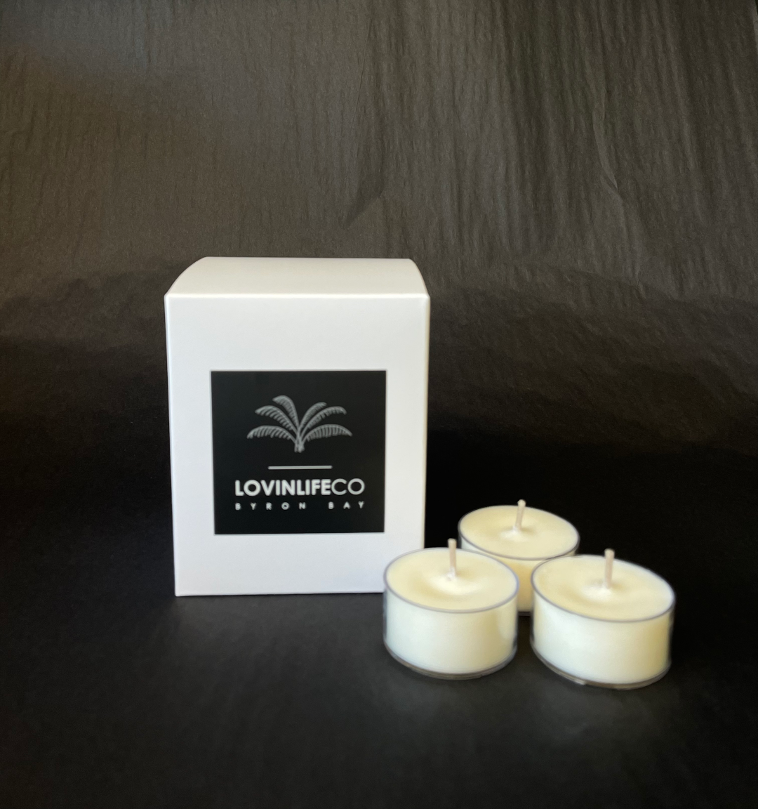 LOVINLIFE Co Byron Bay Signature Range Candles - pure natural unscented soy wax tea light candles - box of 12 pictured with 3 tealight candles in clear recyclable holders - available in our LOVINLIFE Co Homewares Store in Habitat Village in Byron Bay - for all your gifts, candles and interior decorating needs
