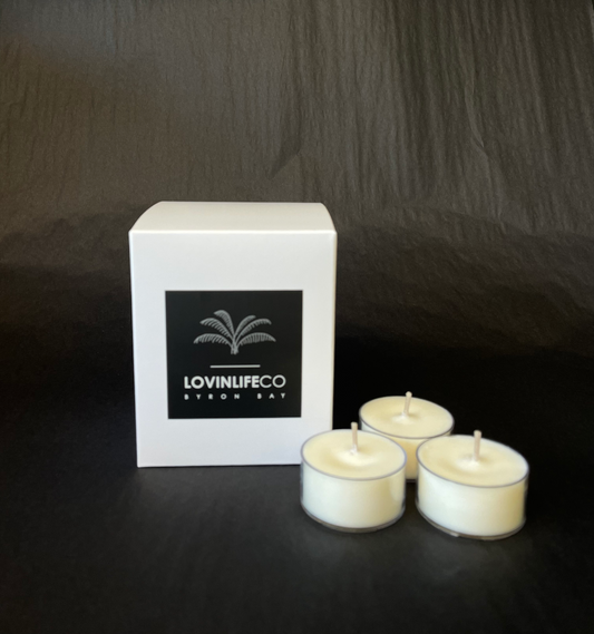 LOVINLIFE Co Byron Bay Signature Range Candles - pure natural unscented soy wax tea light candles - box of 12 pictured with 3 tealight candles in clear recyclable holders - available in our LOVINLIFE Co Homewares Store in Habitat Village in Byron Bay - for all your gifts, candles and interior decorating needs