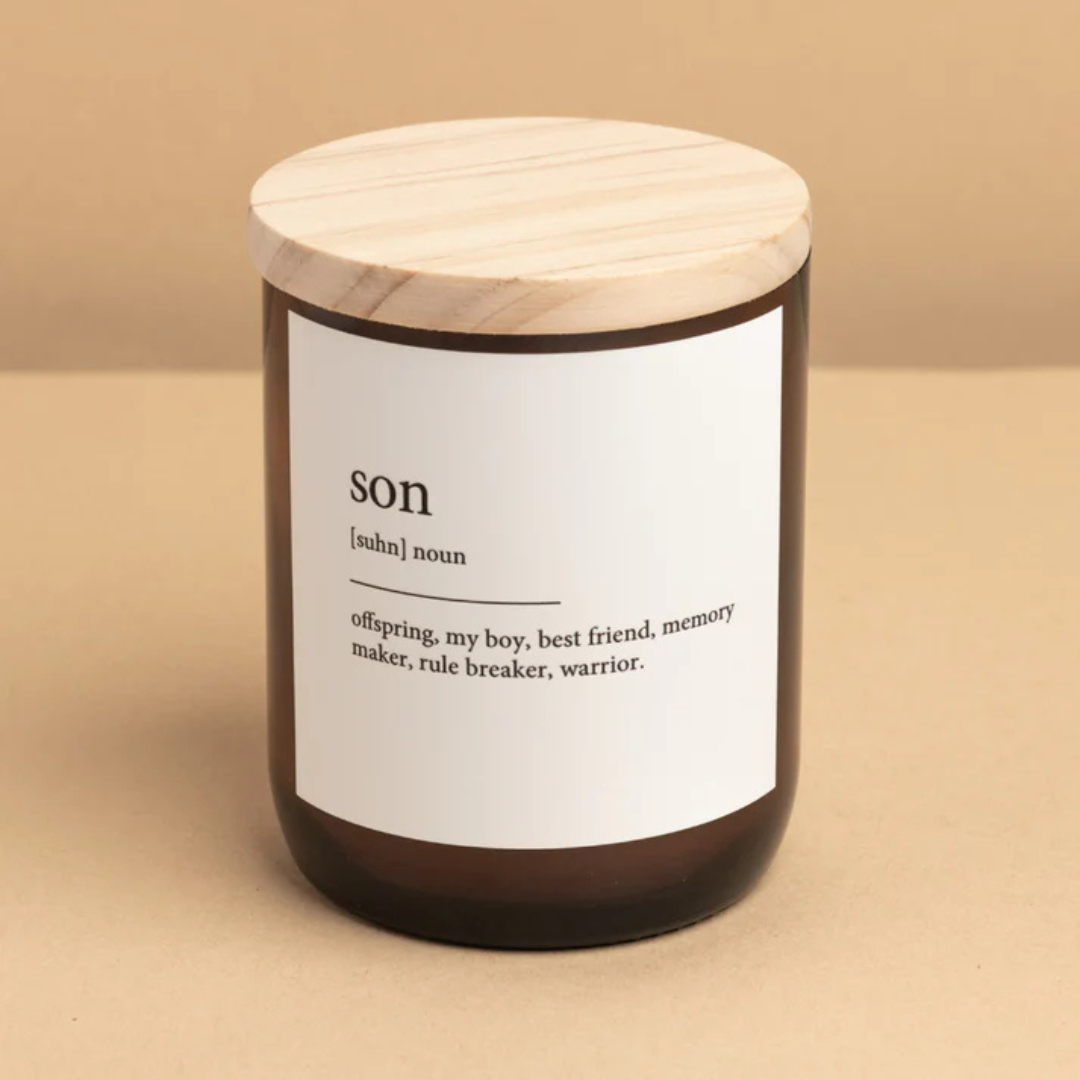 Commonfolk Dictionary Meaning Candle Range - Son - India scent with teakwood + tobacco - jar pictured with lid on against an orange backdrop - Stocked at LOVINLIFE Co Byron Bay for all your gifts, candles and interior decorating needs