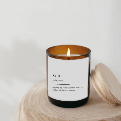Commonfolk Dictionary Meaning Candle Range - Son - India scent with teakwood + tobacco - jar pictured with lid resting on the side of the jar on top of a wood board or table - Stocked at LOVINLIFE Co Byron Bay for all your gifts, candles and interior decorating needs