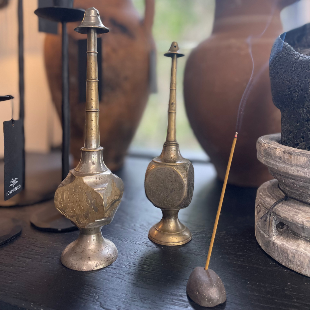 Vintage Indian Perfume Bottles, next to smoking incense stick - on display at LOVINLIFE Co Byron Bay for all your gifts, candles and interior decorating needs