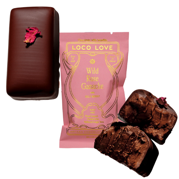 Unwrapped and wrapped (pink) Loco Love Wild Rose Ganache Chocolates. Vegan, gluten-free, sustainably sourced and no refined sugars. Available LOVINLIFE Co Byron Bay.