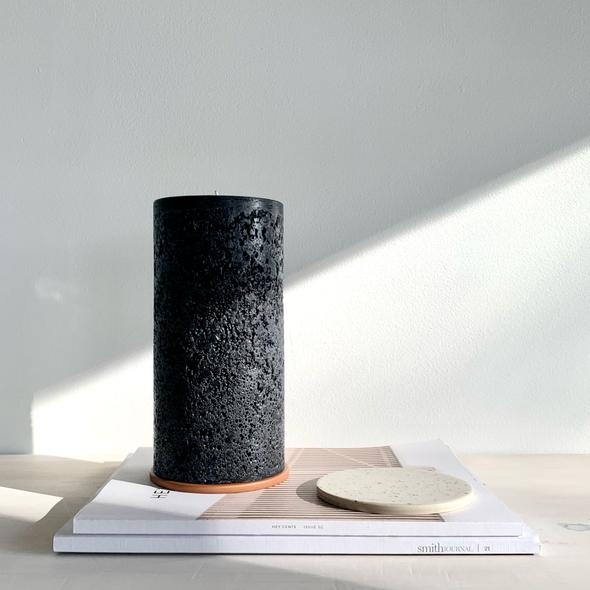 Candle Kiosk - All Natural Textured Pillar Candles - black, medium, unscented  on magazine stack - Stocked at LOVINLIFE Co Byron Bay for all your gifts, candles and interior decorating needs
