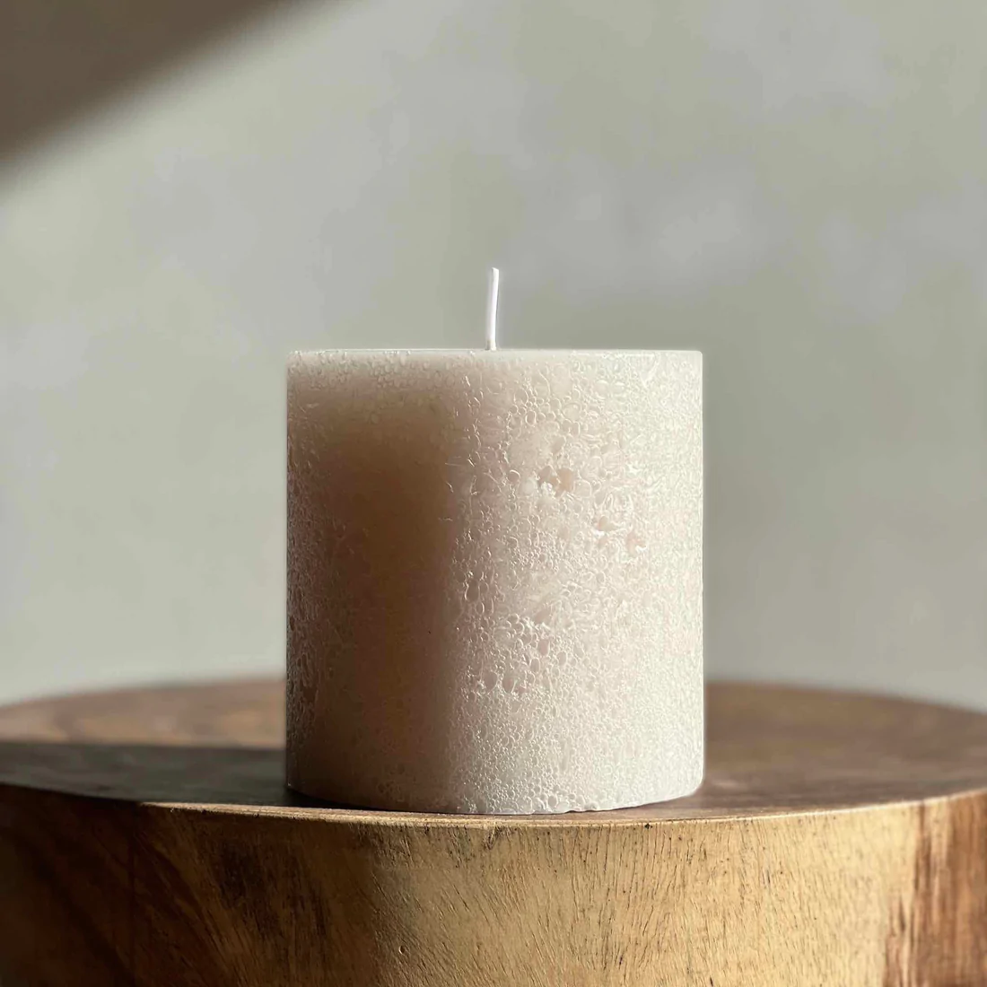 Candle Kiosk - Textured Sandstone Pillar Candles - small candle on wood block - Stocked at LOVINLIFE Co Byron Bay for all your gifts, candles and interior decorating needs
