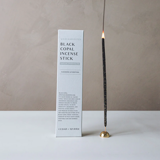 Cedar and Myrrh Black Copal Hand Rolled Incense Stick - pictured alight with box - Stocked at LOVINLIFE Co Byron Bay for all your gifts, candles and interior decorating needs