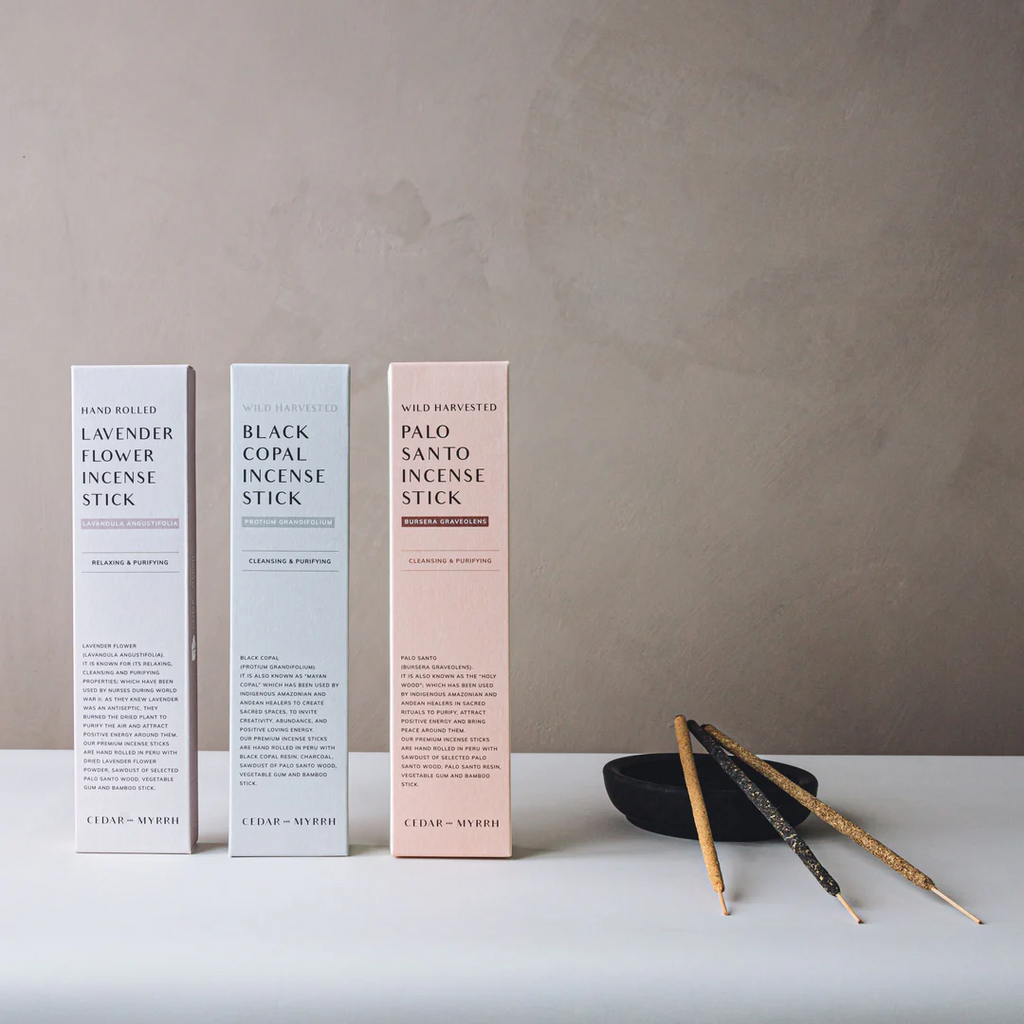 Cedar and Myrrh Hand Rolled Incense Stick range - boxes pictured with a stick of each resting on a black clay smudging bowl - Stocked at LOVINLIFE Co Byron Bay for all your gifts, candles and interior decorating needs