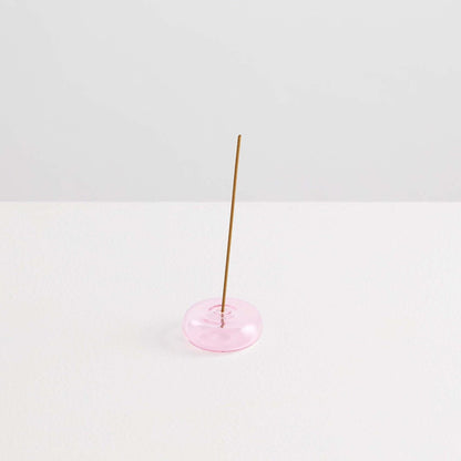 Maison Balzac Le Galet, or the pebble, is a playful and minimal bubble of 100% Borosilicate glass hand blown into a modern incense stick holder - pink glass pebbles with incense stick - Stocked at LOVINLIFE Co Byron Bay for all your gifts, candles and interior decorating needs