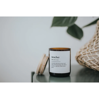 Commonfolk Dictionary Candle - Teacher - amber glass jar on table with wood lid on side - Stocked at LOVINLIFE Co Byron Bay for all your gifts, candles and interior decorating needs