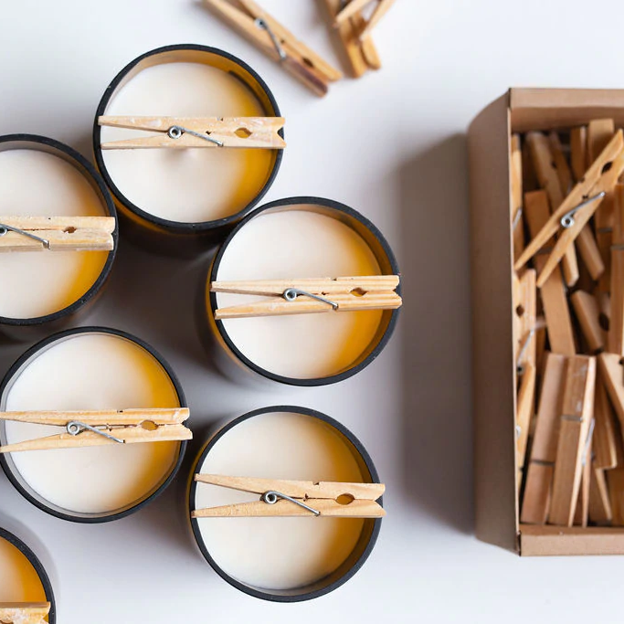 Commonfolk Candles - amber glass jar with pegs holding wick to help it set - flat lay, pictured from above - Stocked at LOVINLIFE Co Byron Bay for all your gifts, candles and interior decorating needs