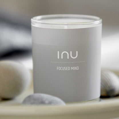 INU Focused MInd Candle - Focused Mind: Neroli, Bergamont, Lemon - soy wax candle with organic cotton wicks and organic essential oils in grey glass jar amongst shells and rocks - Stocked at LOVINLIFE Co Byron Bay for all your gifts, candles and interior decorating needs